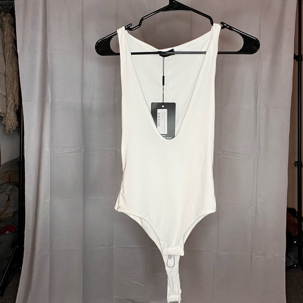 Deep V neck body suit